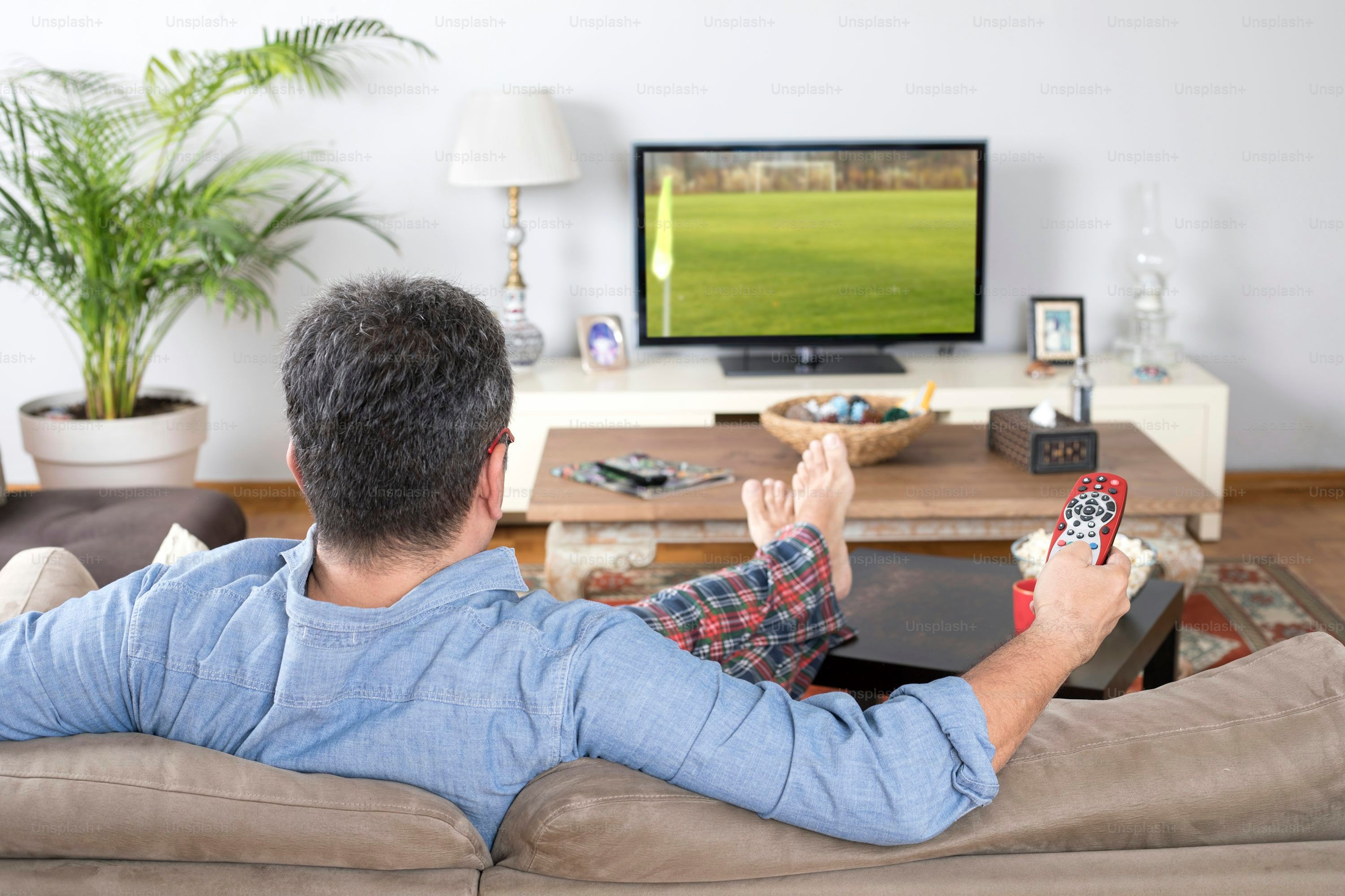 Multiple devices including smart TV and tablet displaying IPTV lifetime streaming content